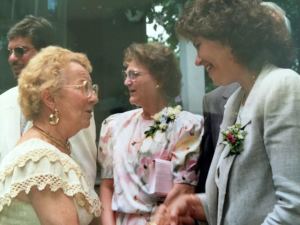 Esther Inglesby, Left, greets Gretchen Worden at our wedding. Gloria Stridick, center. 